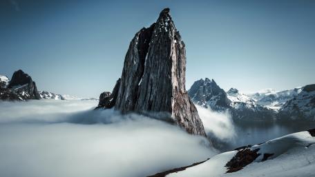 Majestic Mountain Summit Above the Clouds wallpaper