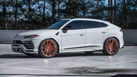 Sleek Luxury SUV with Bold Features and Striking Wheels wallpaper