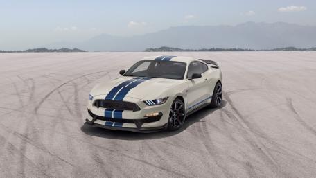 Sleek Mustang in a Stunning Desert Landscape wallpaper