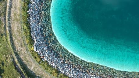Aerial View of Serene Coastal Waters wallpaper