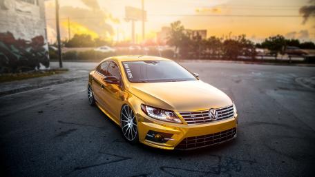 Stunning Golden Volkswagen in Sunset Glow wallpaper