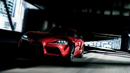 Sleek Red Supersport Car in Motion Underpass View wallpaper