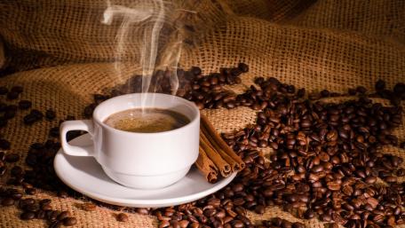 Warm Coffee with Cinnamon and Coffee Beans Inspired by Nature's Comforts wallpaper