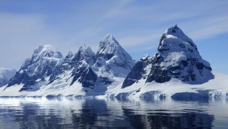 Majestic Snow-Capped Mountain Peaks View wallpaper