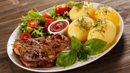 Savory Steak and Sides Delightful Plate Arrangement wallpaper