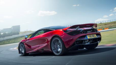 Sleek Red McLaren 4K Wallpaper wallpaper