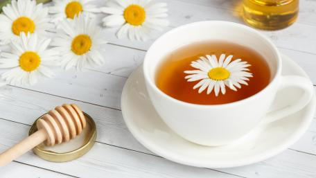 Fresh Chamomile Tea with Honey and Daisies Wallpaper wallpaper
