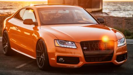 Vibrant Sunset Audi Sport Coupe Wallpaper wallpaper