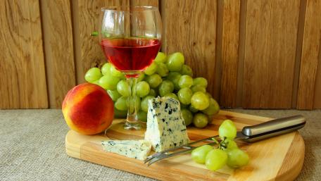 Delightful Cheese and Wine Setup for Gourmet Moods wallpaper