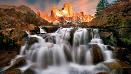 Majestic Mountains and Serene Waterfalls wallpaper