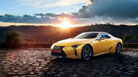 Vibrant Lexus LC Against a Stunning Sunset wallpaper