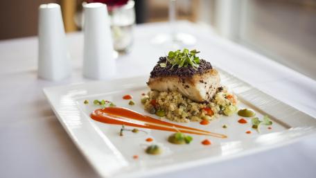Elegant Dinner Plate with Grilled Fish and Quinoa Salad wallpaper