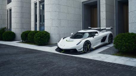 Sleek White Supercar Ready for Adventure wallpaper