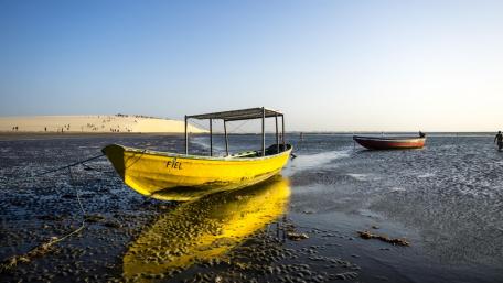 Serene Coastal Scene with Fishing Boats wallpaper