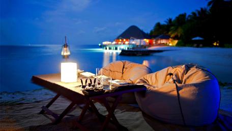 Serene Beachside Romantic Dinner Setup wallpaper
