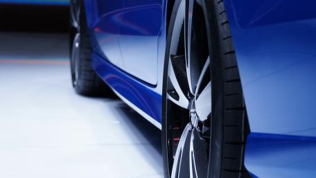 Sleek Blue Car Close-Up Wallpaper wallpaper