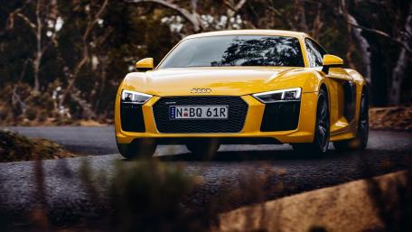 Vibrant Yellow Audi R8 on Scenic Road wallpaper