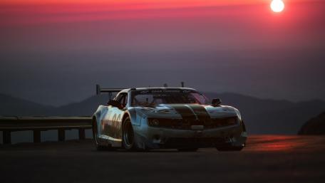Epic Racing Car at Sunset Overlook wallpaper