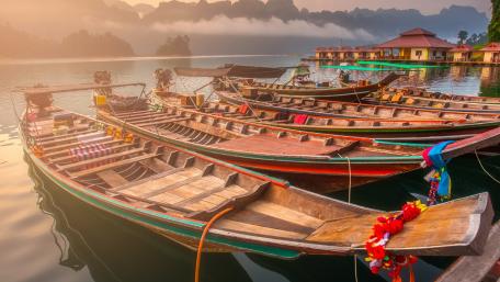 Tranquil Waters with Traditional Boats wallpaper
