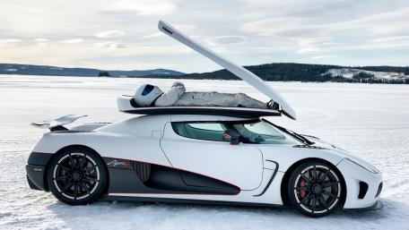 Sleek Winter Supercar Adventure wallpaper