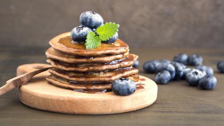 Delicious Pancakes with Blueberries and Maple Syrup wallpaper