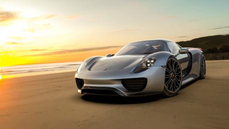 Sleek Performance on the Beach at Sunset wallpaper