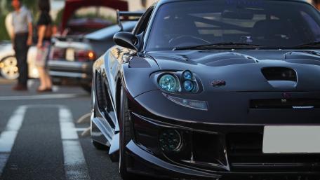 Sleek Black Sports Car Wallpaper wallpaper