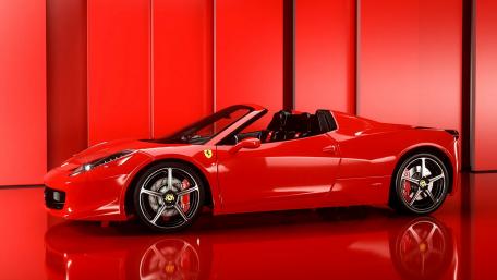 Vibrant Red Ferrari Sports Car Wallpaper wallpaper
