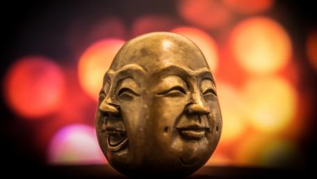 Dual Faces of Happiness and Reflection wallpaper