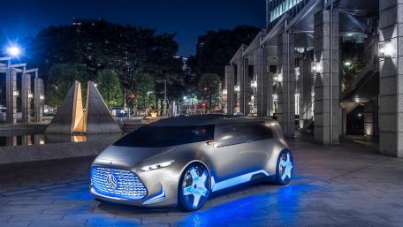 Futuristic Car Design in Urban Night Landscape wallpaper
