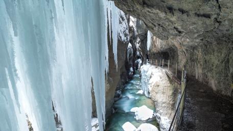 Frozen Waterfall Serenity in Nature's Embrace wallpaper