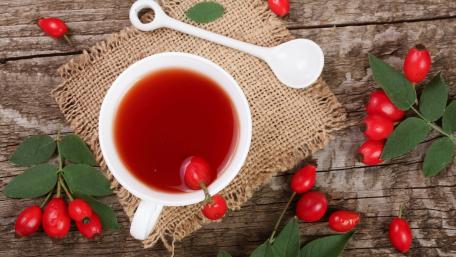 Warm Herbal Tea with Bright Red Berries wallpaper