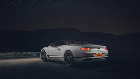 Sleek Elegance Under Starry Skies wallpaper