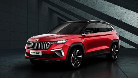 Sleek Red SUV in Urban Setting wallpaper