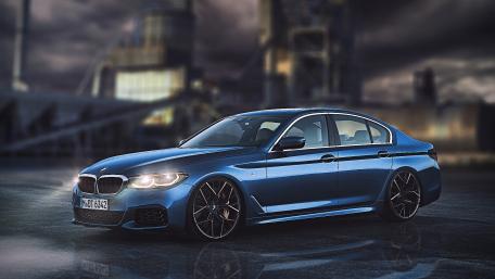 Sleek Blue BMW Sedan in Urban Setting wallpaper