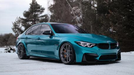 Sleek BMW Luxury on Winter Streets wallpaper