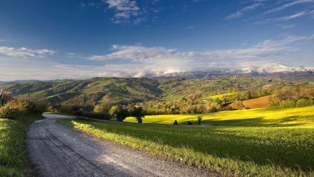 Serene Landscapes Under a Vast Blue Sky wallpaper