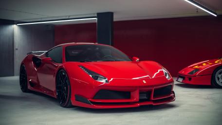 Sleek Red Supercar in Modern Garage wallpaper