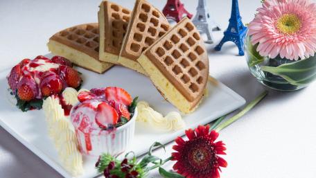 Delicious Waffles and Strawberries Delightful Treats for Your Sweet Tooth wallpaper