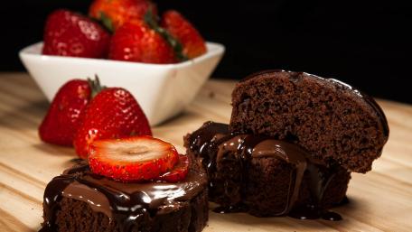 Indulgent Chocolate Brownies with Fresh Strawberries wallpaper
