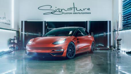 Sleek Custom Car in a Modern Garage wallpaper