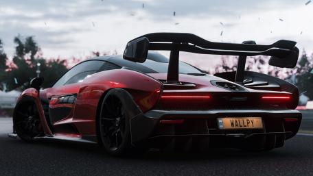 Stylish Red Hypercar on the Track wallpaper
