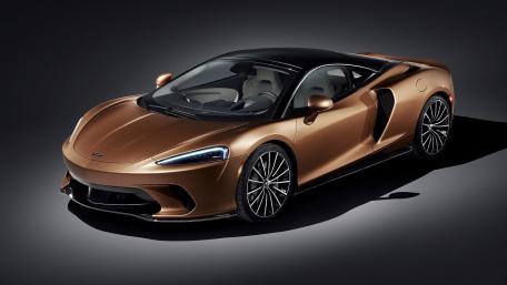 Sleek McLaren GT in Stunning Bronze Finish wallpaper