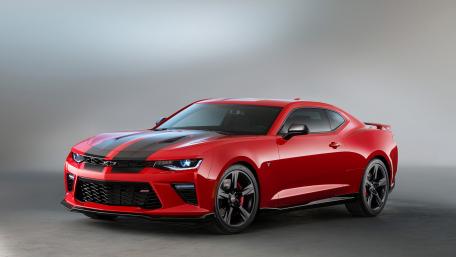 Sleek Red Camaro Capturing Speed and Power wallpaper