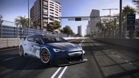 Sleek Performance Car on Urban Racetrack wallpaper