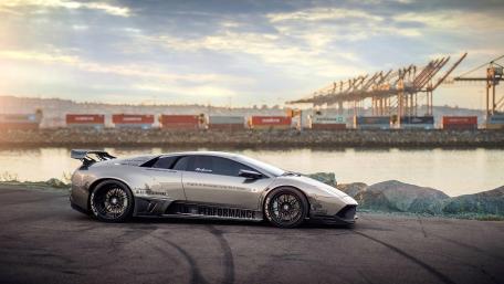 Sleek Performance Car by the Waterfront wallpaper