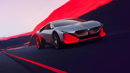 Futuristic BMW Concept Car on Vibrant Road Scene wallpaper
