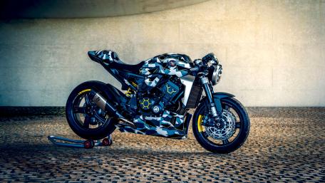 Sleek Motorcycle in Stunning Camouflage Design wallpaper