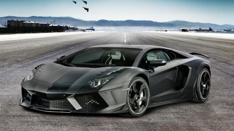 Sleek Carbon Fiber Supercar Wallpaper wallpaper