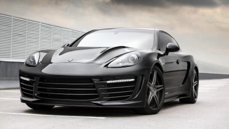 Sleek Black Sports Car Wallpaper wallpaper